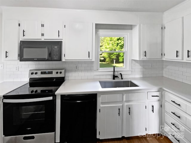 269 Bud Black Rd, Crouse, NC 28033 - kitchen featuring light countertops, white cabinetry, a sink, and black appliances