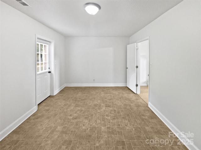 269 Bud Black Rd, Crouse, NC 28033 - spare room with baseboards and visible vents