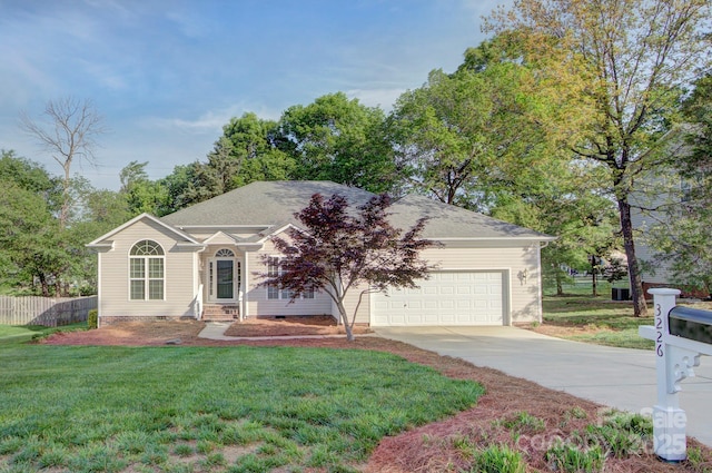 3226 Chatfield Ln SW, Concord, NC 28027 - single story home featuring crawl space, a garage, concrete driveway, fence, and a front yard