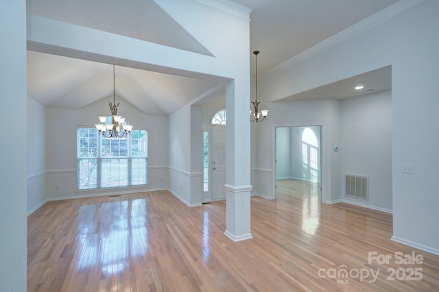 3226 Chatfield Ln SW, Concord, NC 28027 - interior space featuring visible vents, light wood finished floors, baseboards, and an inviting chandelier