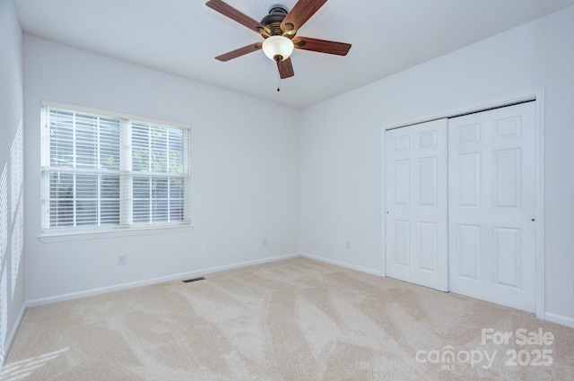3226 Chatfield Ln SW, Concord, NC 28027 - unfurnished bedroom with visible vents, baseboards, and carpet floors