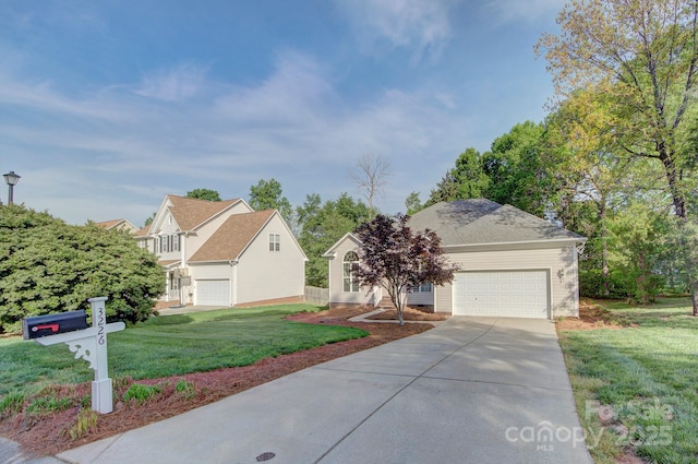 3226 Chatfield Ln SW, Concord, NC 28027 - view of front of property featuring a garage, driveway, and a front yard