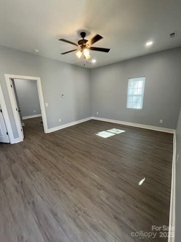 spare room with recessed lighting, baseboards, ceiling fan, and dark wood finished floors
