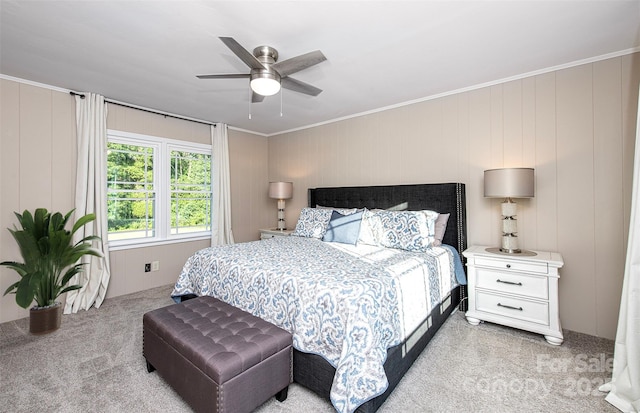 bedroom with light carpet, a ceiling fan, and crown molding