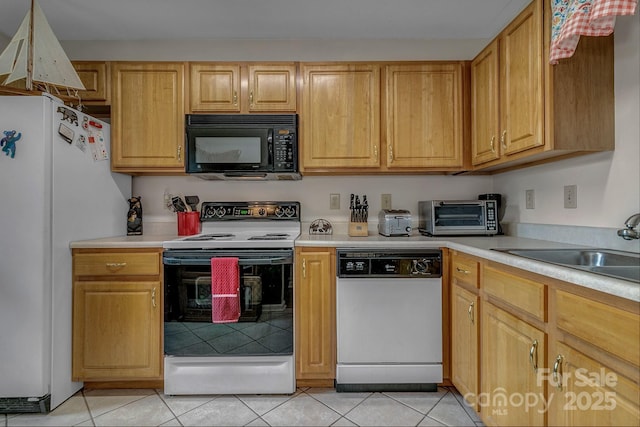 101 Carlyle Way, Asheville, NC 28803 - kitchen with a toaster, white appliances, and light countertops
