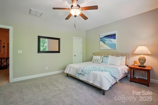 bedroom featuring baseboards, a ceiling fan, carpet flooring, and visible vents