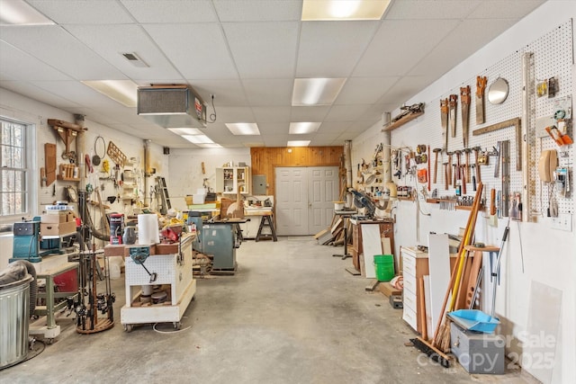 98 Fox Trl, Tryon, NC 28782 - garage featuring visible vents and a workshop area