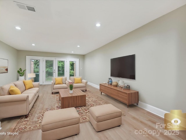 7004 Quail Hill Rd, Charlotte, NC 28210 - living area with baseboards, recessed lighting, visible vents, and light wood-style floors