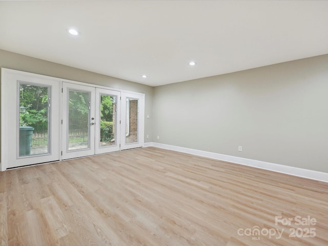 7004 Quail Hill Rd, Charlotte, NC 28210 - spare room with french doors, light wood-type flooring, recessed lighting, and baseboards