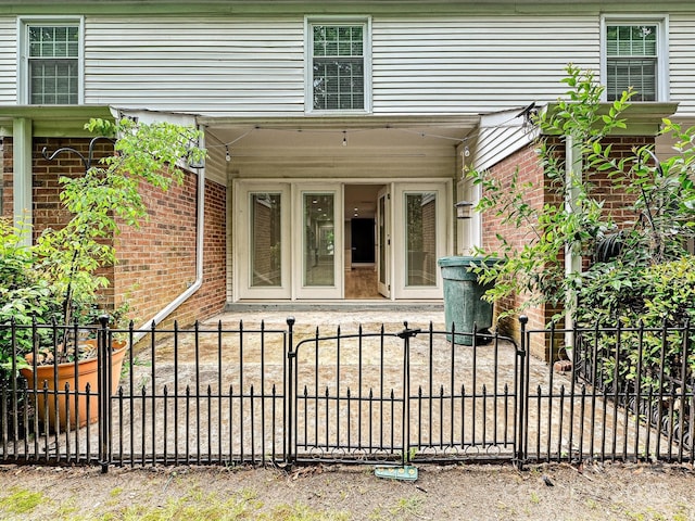 7004 Quail Hill Rd, Charlotte, NC 28210 - entrance to property with brick siding and fence