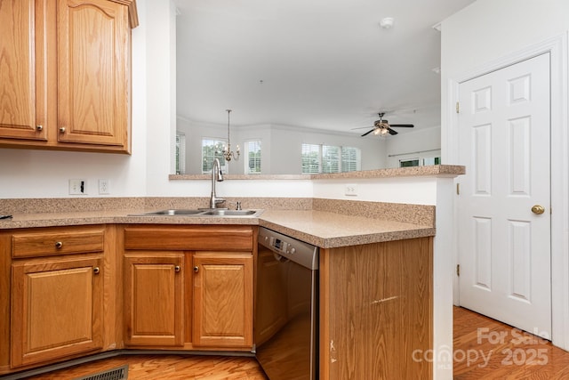 3158 Walnut Park Dr, Charlotte, NC 28262 - kitchen featuring stainless steel dishwasher, a sink, a peninsula, ceiling fan, and light countertops