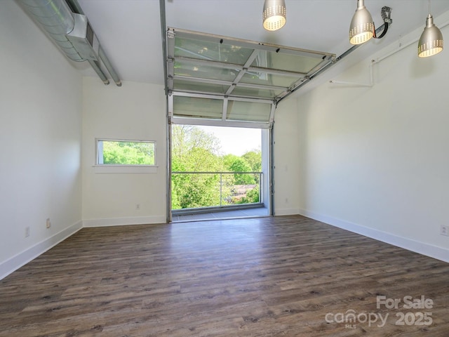 1611 Central Ave Unit 406, Charlotte, NC 28205 - garage with baseboards