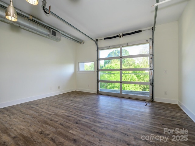 1611 Central Ave Unit 406, Charlotte, NC 28205 - garage with baseboards