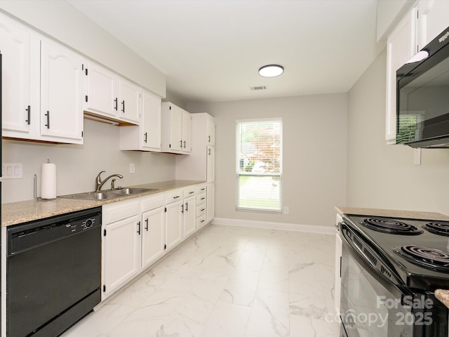 kitchen featuring white cabinets, a sink, baseboards, marble finish floor, and black appliances