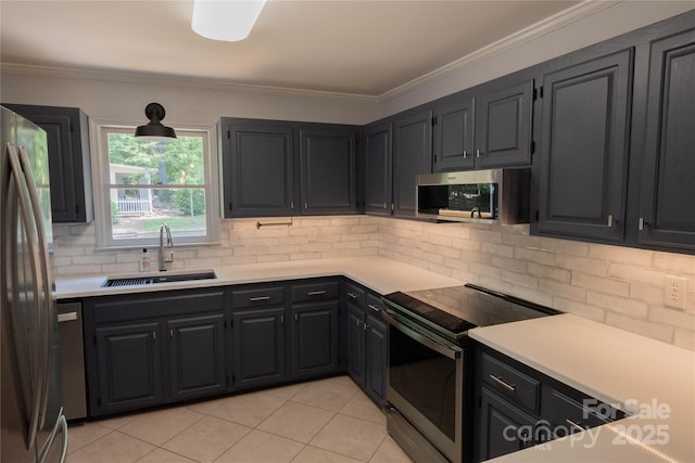 432 Partridge Pl, York, SC 29745 - kitchen featuring a sink, stainless steel appliances, backsplash, crown molding, and light tile patterned flooring