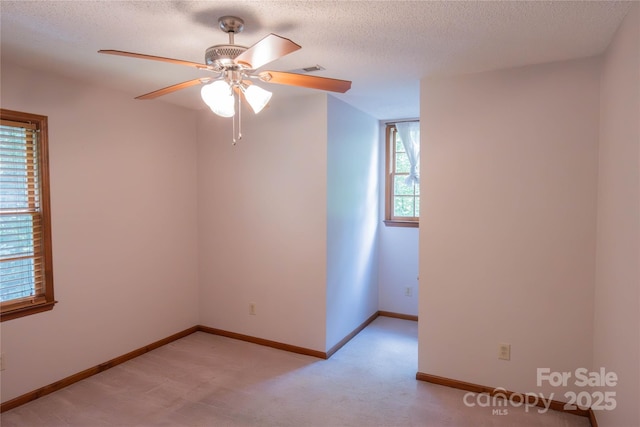 432 Partridge Pl, York, SC 29745 - spare room featuring a ceiling fan, light colored carpet, a textured ceiling, and baseboards