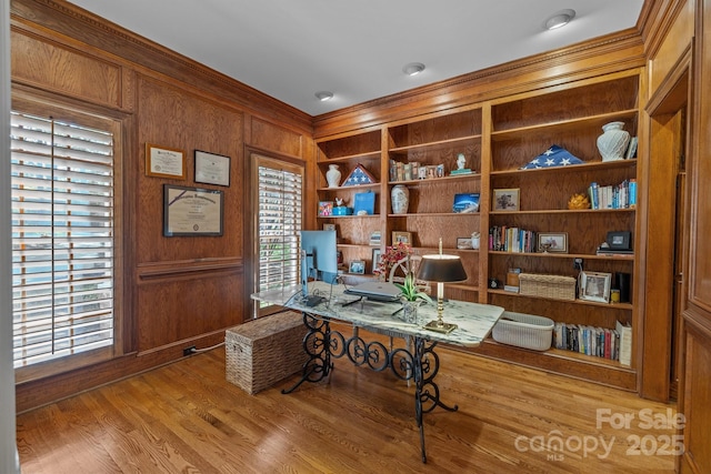 6824 N Baltusrol Ln, Charlotte, NC 28210 - home office featuring built in features, wood walls, ornamental molding, and wood finished floors