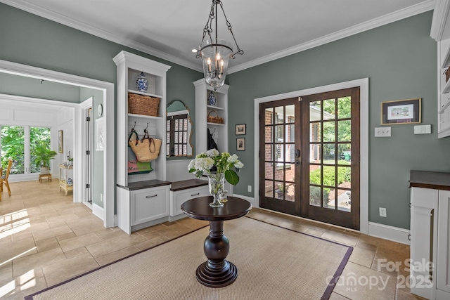 6824 N Baltusrol Ln, Charlotte, NC 28210 - entryway with french doors, stone tile flooring, ornamental molding, and baseboards