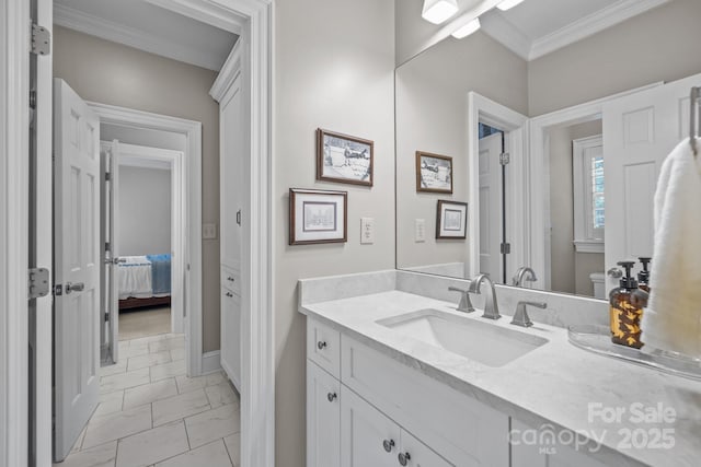 6824 N Baltusrol Ln, Charlotte, NC 28210 - bathroom with marble finish flooring, ornamental molding, vanity, baseboards, and ensuite bathroom