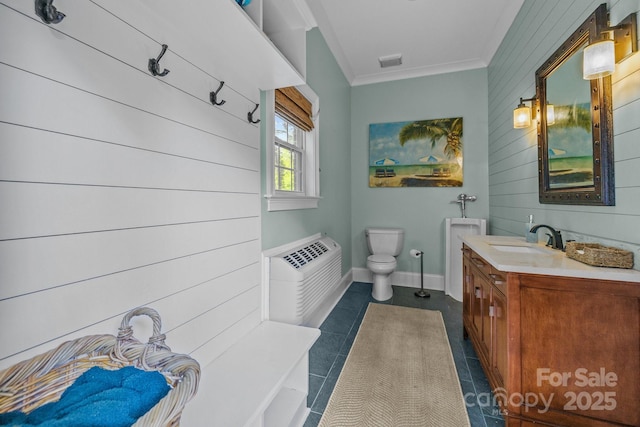 6824 N Baltusrol Ln, Charlotte, NC 28210 - bathroom featuring ornamental molding, tile patterned flooring, vanity, wooden walls, and toilet