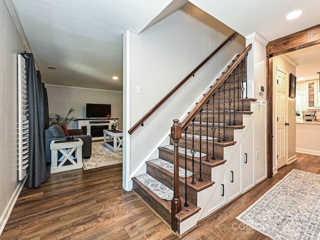 8200 Lansford Rd, Charlotte, NC 28277 - stairs featuring recessed lighting, ornamental molding, baseboards, and wood finished floors