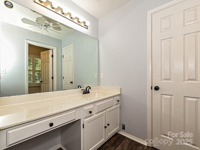 8200 Lansford Rd, Charlotte, NC 28277 - bathroom with baseboards, a ceiling fan, wood finished floors, and vanity