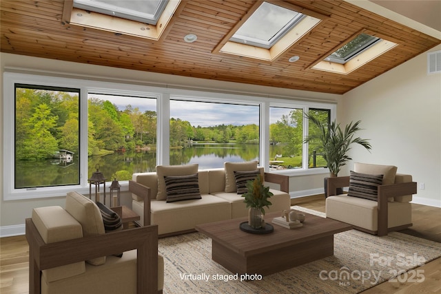 61 Tsataga Ct, Brevard, NC 28712 - sunroom / solarium featuring a water view, visible vents, and a skylight