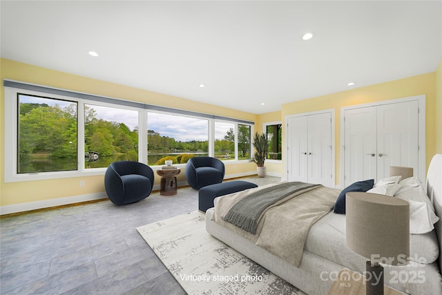 61 Tsataga Ct, Brevard, NC 28712 - bedroom featuring baseboards, multiple closets, and recessed lighting