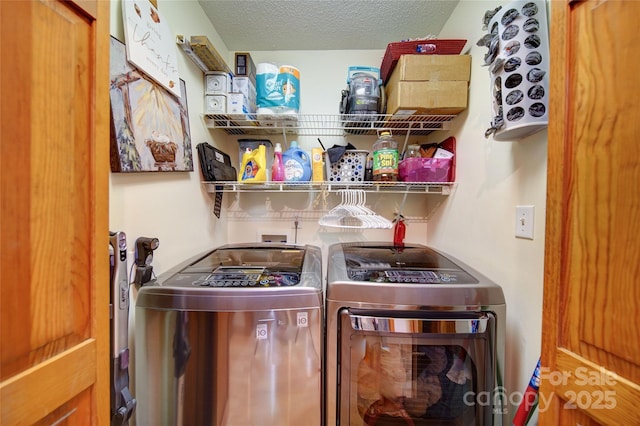 122 Roxboro Ct Unit 286, Mount Gilead, NC 27306 - laundry room featuring laundry area, washer and clothes dryer, and a textured ceiling