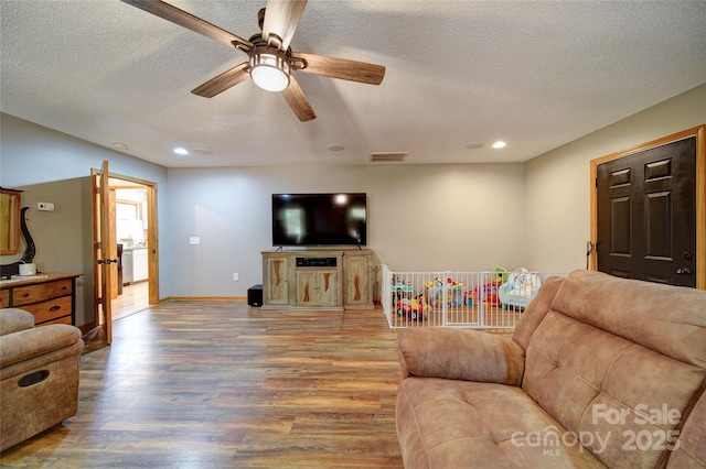 122 Roxboro Ct Unit 286, Mount Gilead, NC 27306 - living area featuring a ceiling fan, a textured ceiling, visible vents, wood finished floors, and recessed lighting