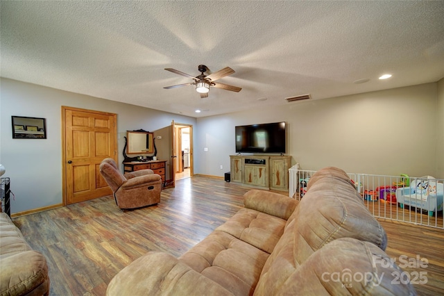 122 Roxboro Ct Unit 286, Mount Gilead, NC 27306 - living room featuring visible vents, baseboards, ceiling fan, and wood finished floors