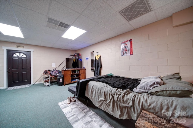 122 Roxboro Ct Unit 286, Mount Gilead, NC 27306 - bedroom featuring visible vents, a paneled ceiling, carpet floors, and concrete block wall