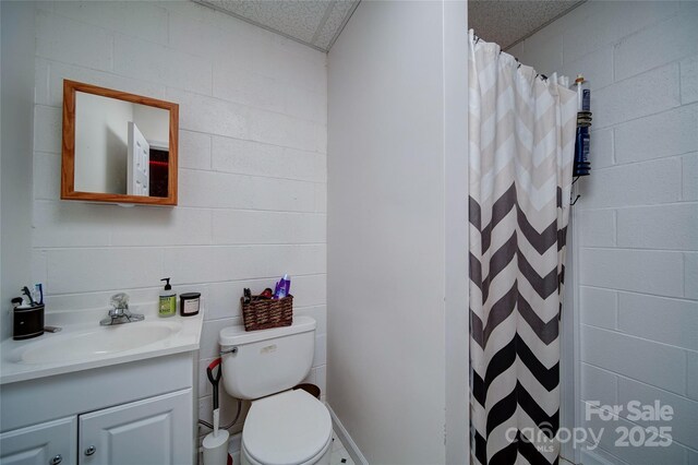 122 Roxboro Ct Unit 286, Mount Gilead, NC 27306 - full bath with vanity, a shower with shower curtain, and toilet