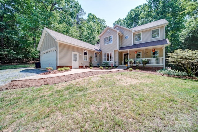 122 Roxboro Ct Unit 286, Mount Gilead, NC 27306 - traditional-style house featuring a shingled roof, a front lawn, a garage, covered porch, and driveway