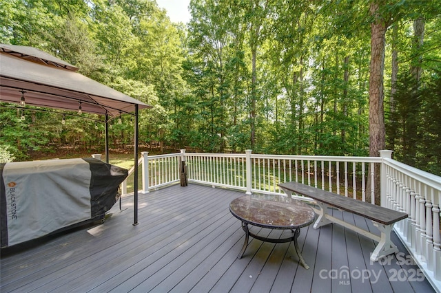 122 Roxboro Ct Unit 286, Mount Gilead, NC 27306 - wooden deck featuring a gazebo and a forest view