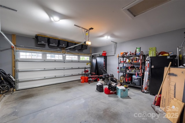1024 Scotch Meadows Loop Unit 32, Monroe, NC 28110 - garage with freestanding refrigerator