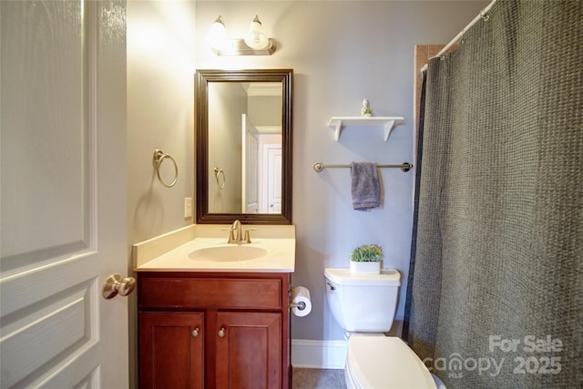 full bath with vanity, a shower with shower curtain, and toilet