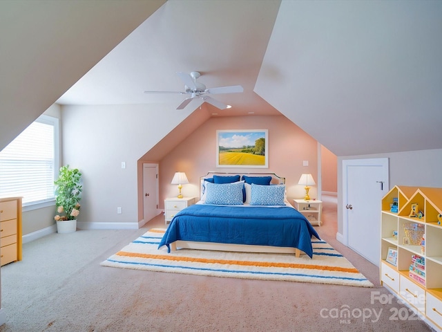bedroom with lofted ceiling, baseboards, carpet, and ceiling fan