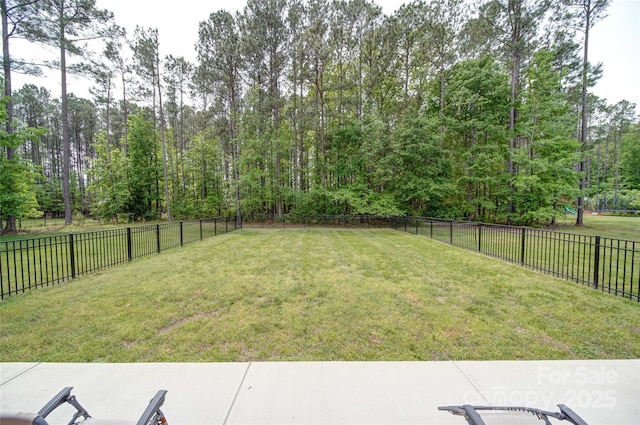 view of yard with a fenced backyard