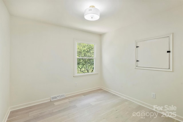 7506 Kilcullen Dr, Charlotte, NC 28270 - spare room with light wood-type flooring, baseboards, and visible vents