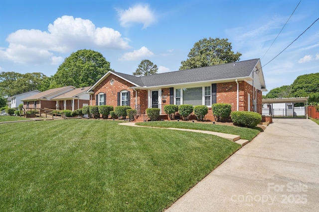 single story home featuring brick siding, a shingled roof, a front lawn, and a gate