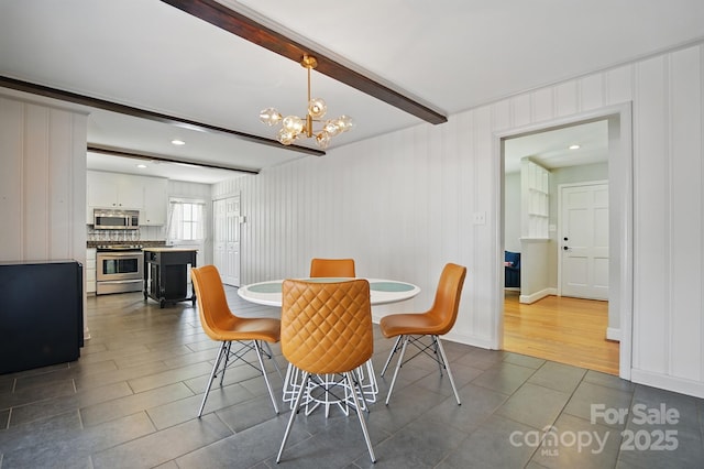 dining area featuring beamed ceiling, dark tile patterned floors, a notable chandelier, and recessed lighting