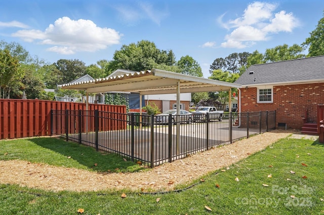 view of swimming pool featuring a fenced backyard and a yard