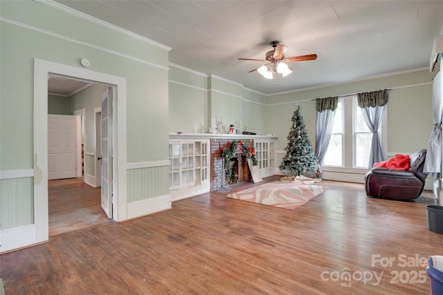 302 Charlotte St, York, SC 29745 - recreation room featuring wood finished floors, a ceiling fan, and ornamental molding