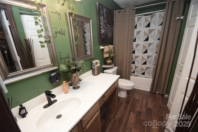 full bath featuring shower / bath combo, toilet, vanity, and wood finished floors