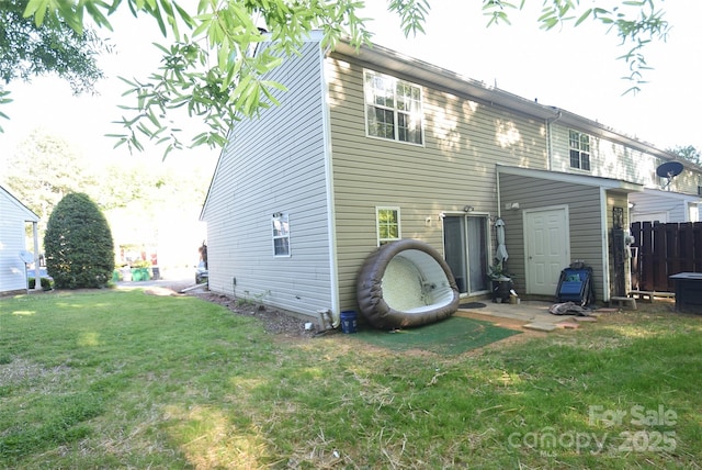 11130 Whitlock Xing, Charlotte, NC 28273 - back of property featuring a lawn