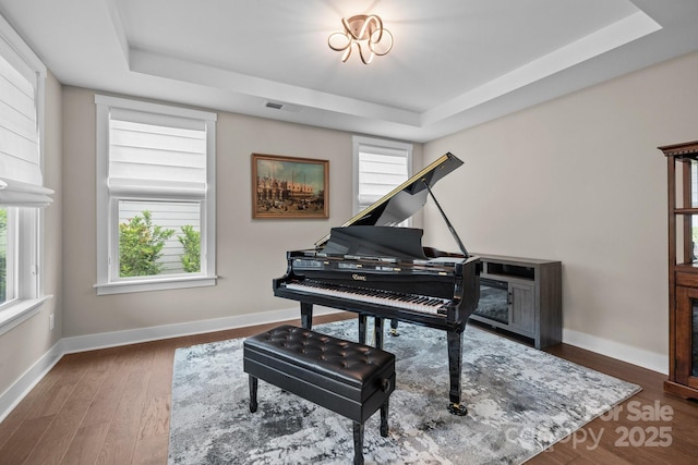 1548 Striped Bass Ln, Clover, SC 29710 - sitting room featuring a raised ceiling, baseboards, wood finished floors, and visible vents