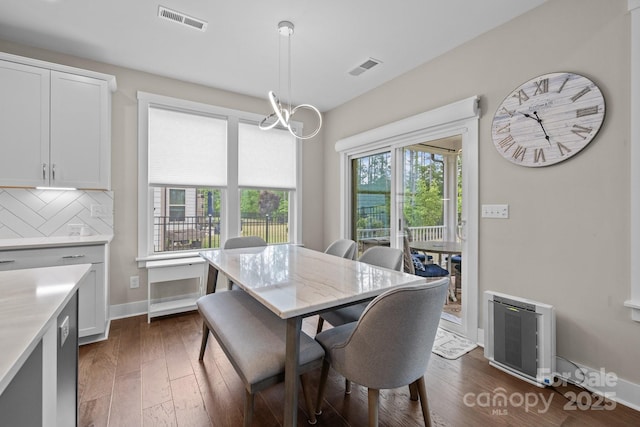 1548 Striped Bass Ln, Clover, SC 29710 - dining space featuring visible vents, baseboards, and dark wood-type flooring