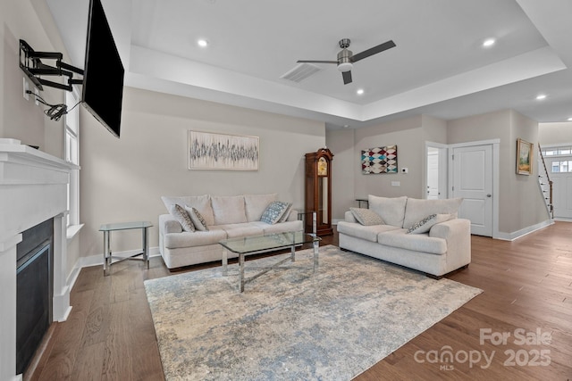 1548 Striped Bass Ln, Clover, SC 29710 - living area featuring ceiling fan, dark wood finished floors, baseboards, and a raised ceiling