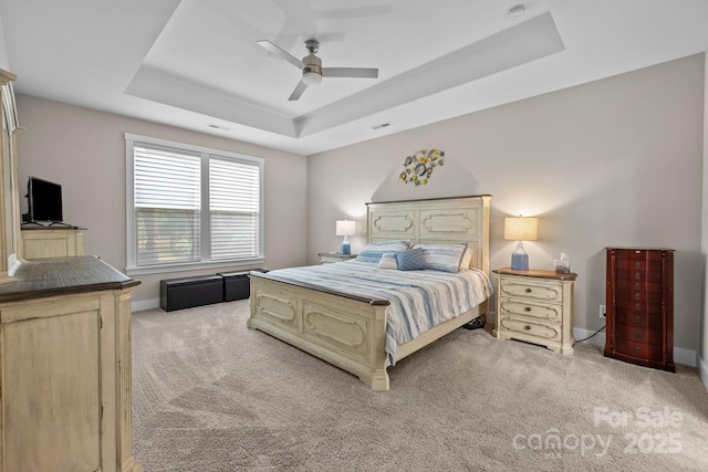1548 Striped Bass Ln, Clover, SC 29710 - bedroom with a ceiling fan, visible vents, light colored carpet, baseboards, and a tray ceiling